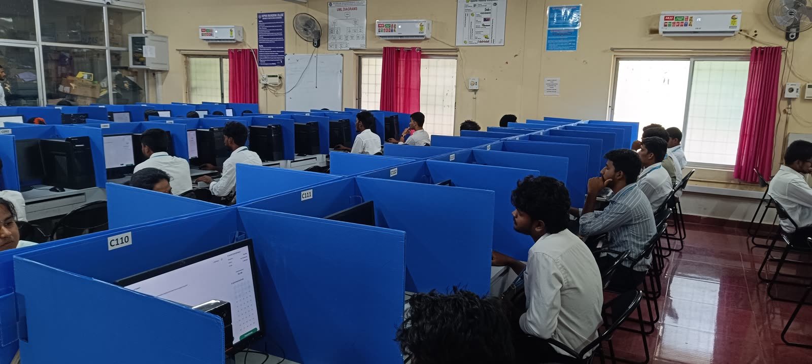 Students working through coding problems in a lab at a GeekBase campus DSA workshop